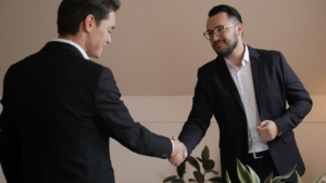 Two business men shaking hands